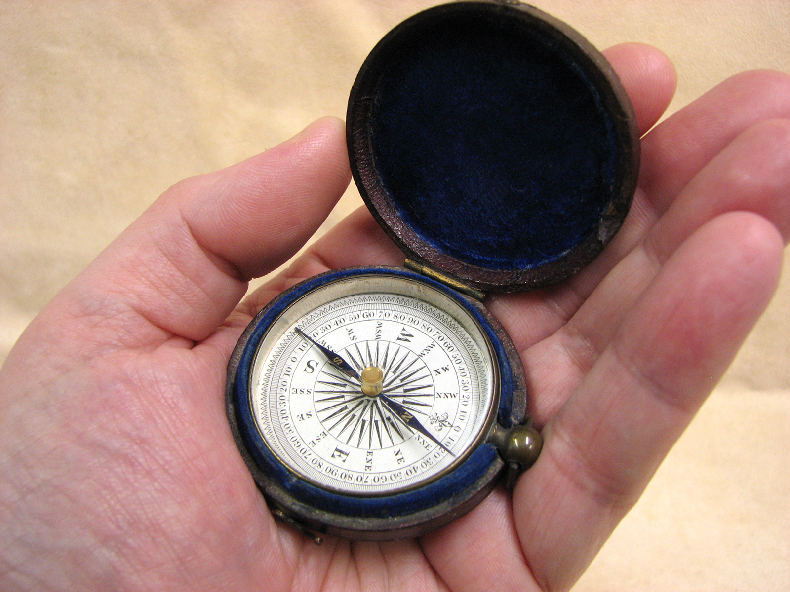 Early Victorian pocket compass in leather covered outer case circa 1860